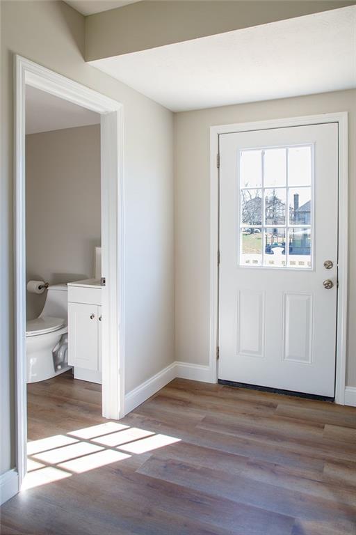 1070 Chapel Road Monaca, PA 15061 - Photo 19 of 24 a view of entryway with wooden floor and a bathroom