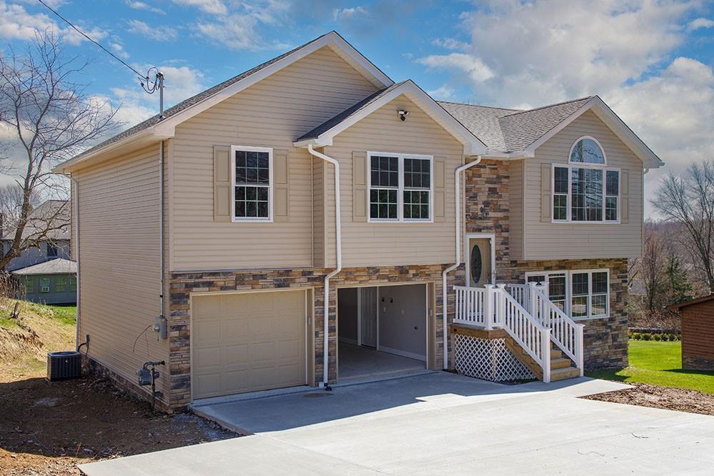 1070 Chapel Road Monaca, PA 15061 - Photo 24 of 24 a front view of a house with a garage