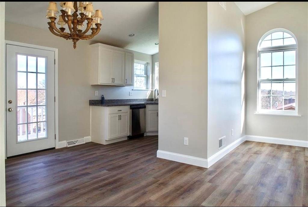 1070 Chapel Road Monaca, PA 15061 - Photo 4 of 24 wooden floor in an empty room with a window