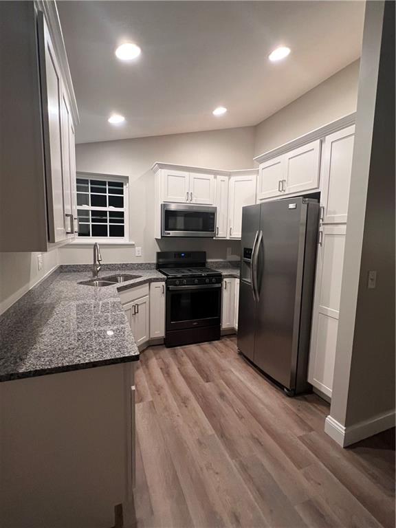 1070 Chapel Road Monaca, PA 15061 - Photo 5 of 24 a kitchen with stainless steel appliances granite countertop a refrigerator and a sink