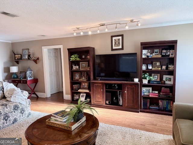 968 St Mathews Church Road Metter, GA 30439 - Photo 12 of 35 a living room with furniture and a flat screen tv