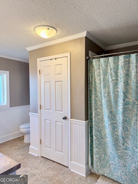 968 St Mathews Church Road Metter, GA 30439 - Photo 19 of 35 a bathroom with a shower curtain and a toilet