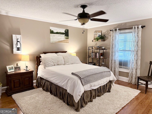 968 St Mathews Church Road Metter, GA 30439 - Photo 21 of 35 a bedroom with a bed a dresser and a large mirror next to a window