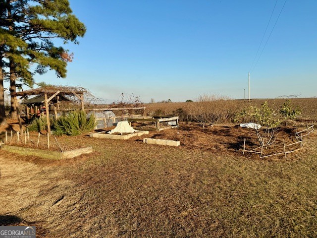 968 St Mathews Church Road Metter, GA 30439 - Photo 33 of 35 an aerial view of residential building with parking space