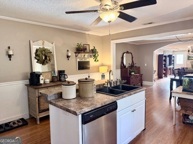 968 St Mathews Church Road Metter, GA 30439 - Photo 7 of 35 a kitchen with a stove a sink and a refrigerator with wooden floor
