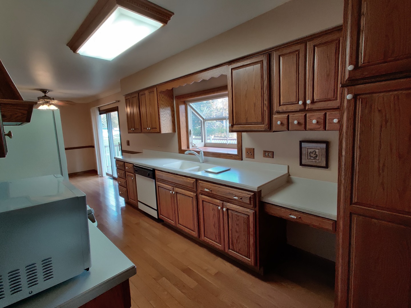 8N601 Stevens Road Elgin, IL 60124 - Photo 2 of 34 a kitchen with stainless steel appliances granite countertop a sink stove and refrigerator