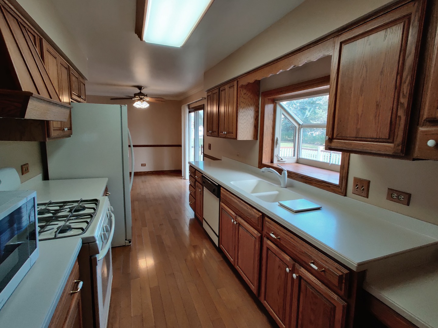 8N601 Stevens Road Elgin, IL 60124 - Photo 3 of 34 a kitchen with stainless steel appliances a sink stove and cabinets