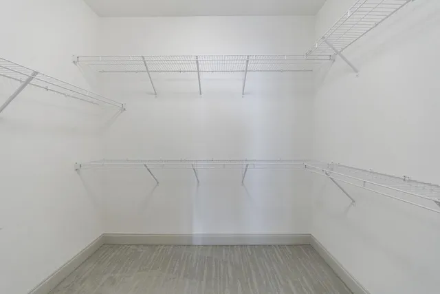 a view of a room with racks on the wall