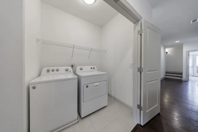 a utility room with dryer and washer