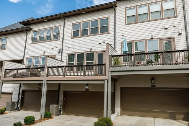 a sign that is in front of flowers