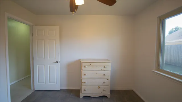 a view of an empty walk in closet