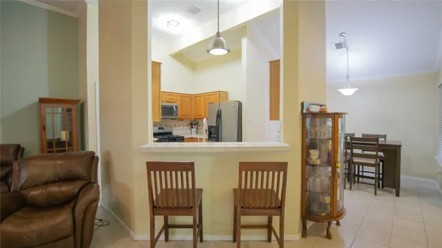 a view of a dining room with furniture