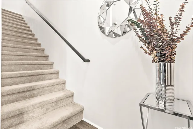 a view of a kitchen from the hallway