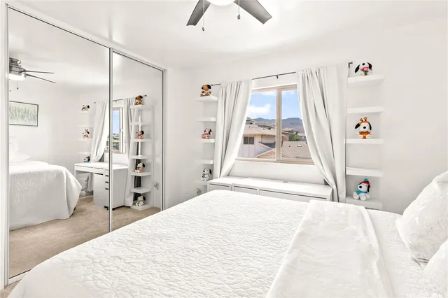 a bathroom with a sink a toilet and vanity