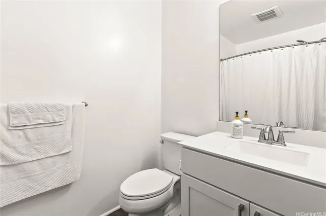 a bedroom with a bed and a walk in closet