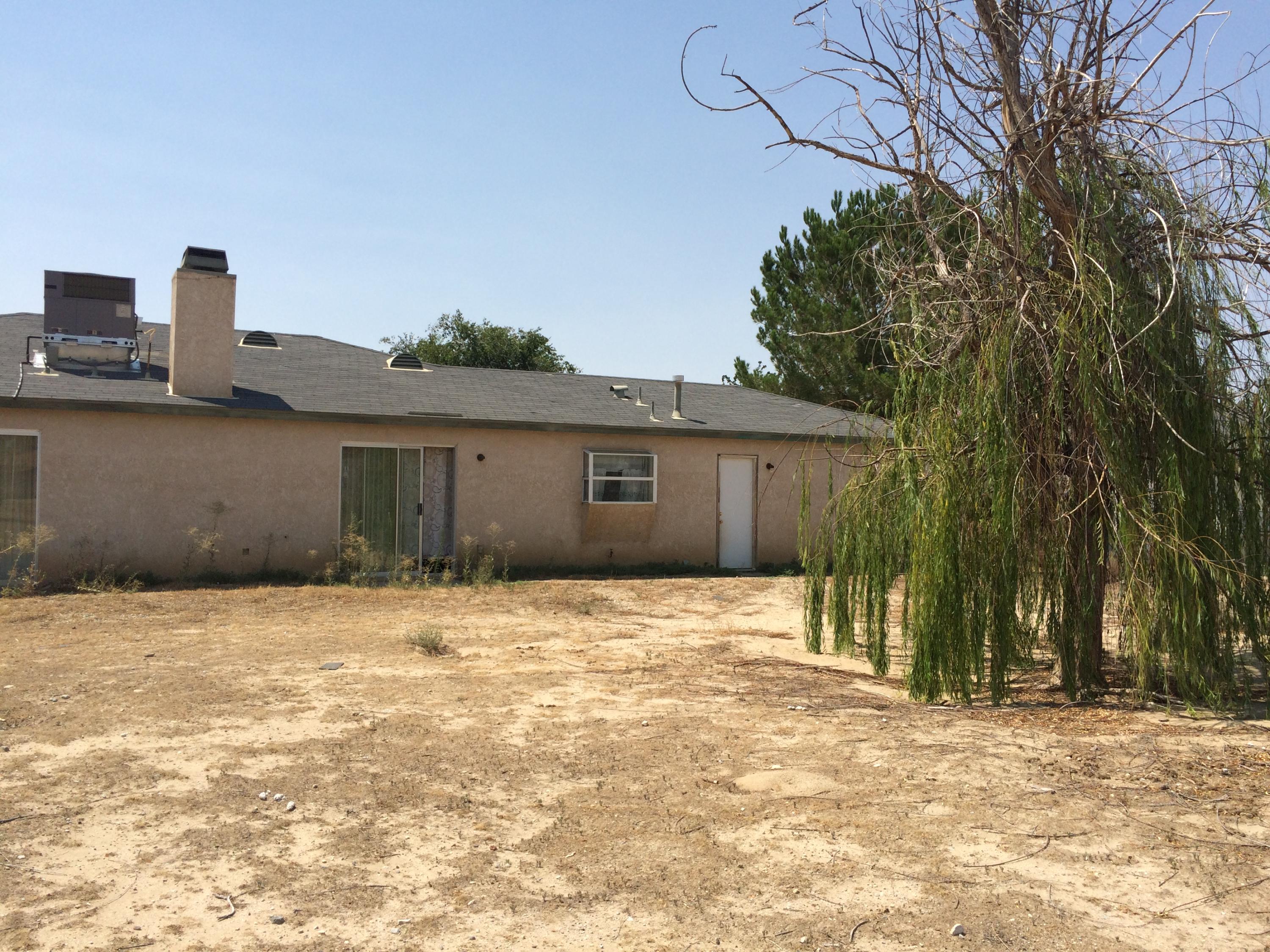 40304 Ridgemist Street Palmdale, CA 93591 - Photo 22 of 24 REAR OF HOUSE 3