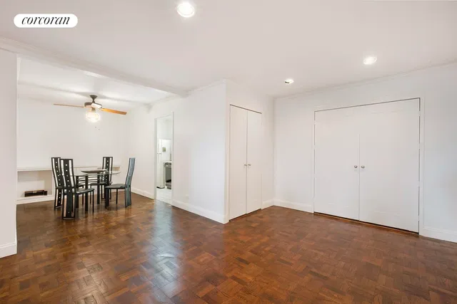 a view of dining room with furniture and wooden floor