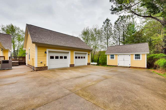 957 Thompson Road Pegram, TN 37143 - Photo 27 of 27 2 Car garage and on eof the nicest sheds you will come across.