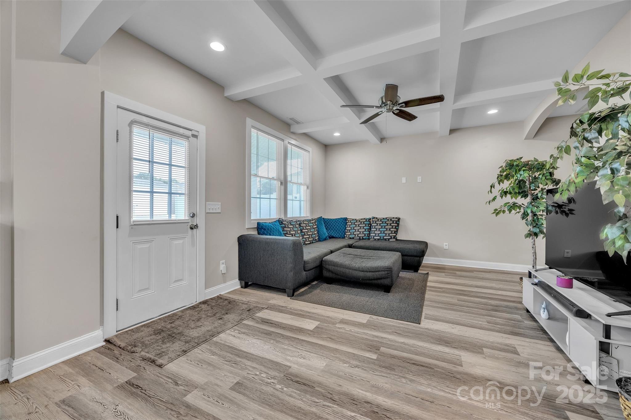 2510 Snow Creek Road Northeast Hickory, NC 28601 - Photo 15 of 45 a living room with furniture potted plant and a window