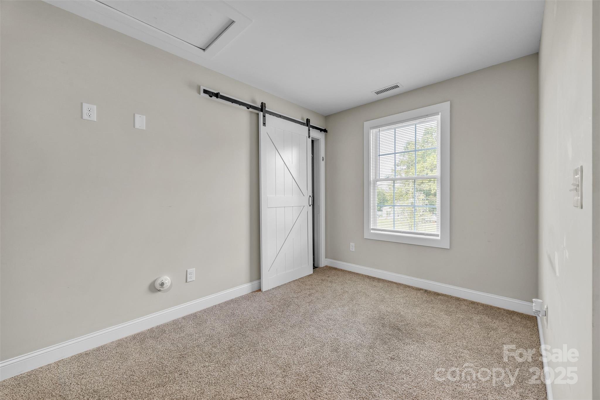 2510 Snow Creek Road Northeast Hickory, NC 28601 - Photo 21 of 45 a view of an empty room with a window