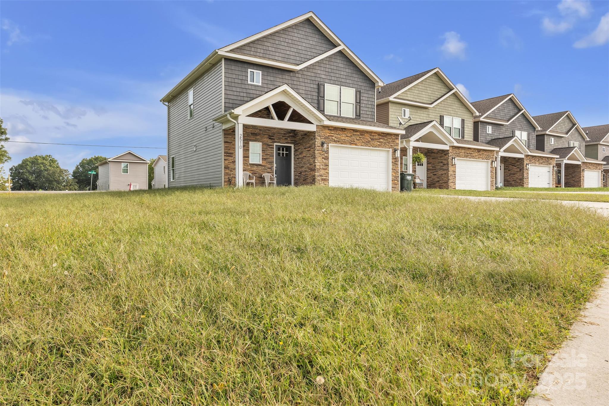 2510 Snow Creek Road Northeast Hickory, NC 28601 - Photo 38 of 45 a front view of a house with a yard
