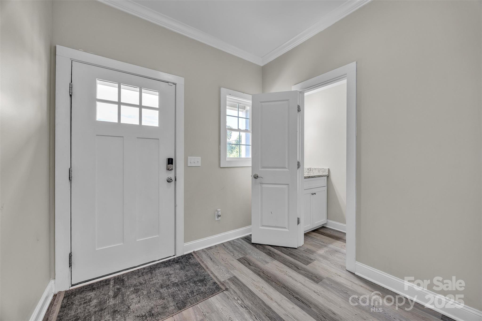 2510 Snow Creek Road Northeast Hickory, NC 28601 - Photo 4 of 45 wooden floor with white walls