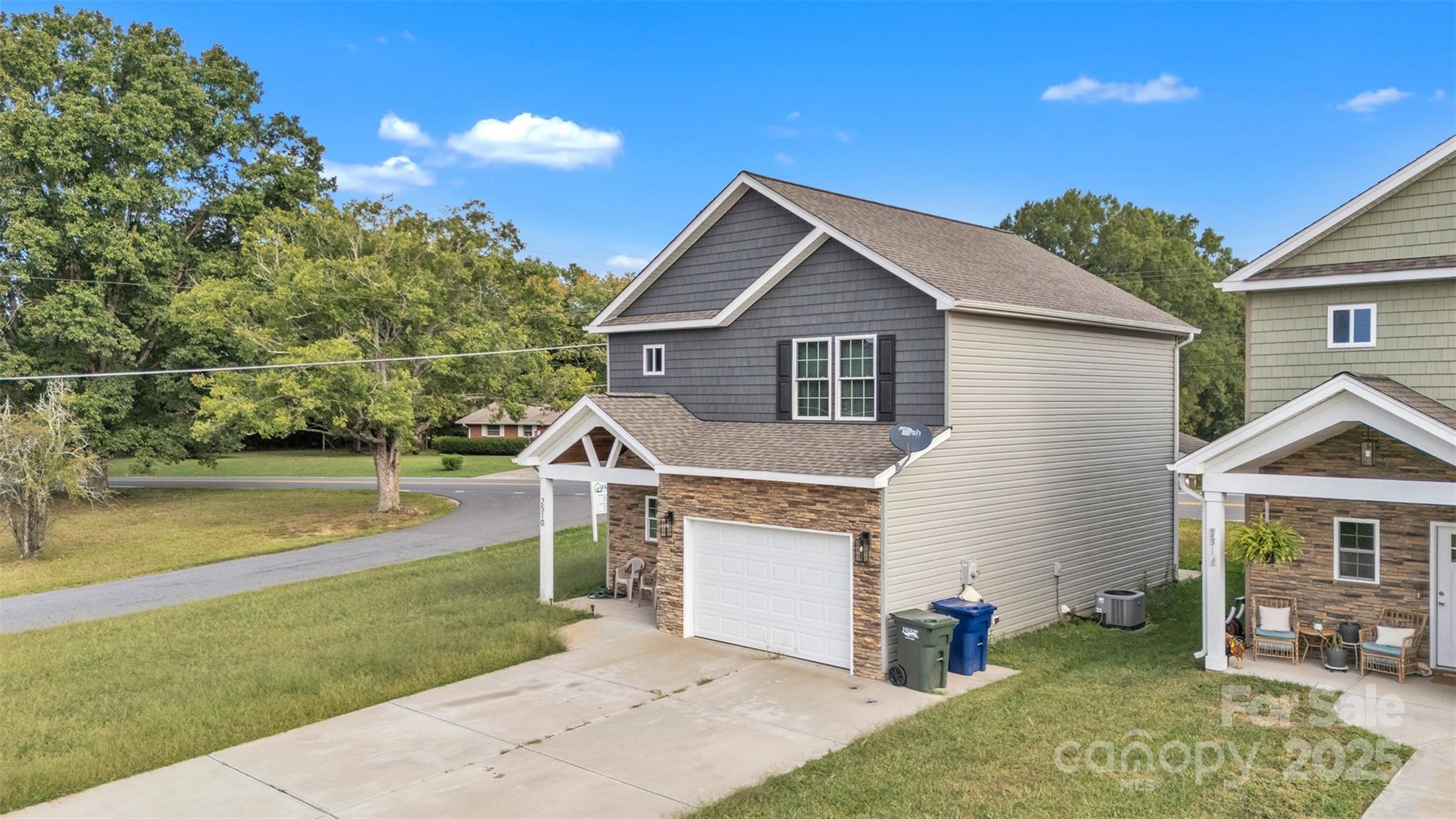 2510 Snow Creek Road Northeast Hickory, NC 28601 - Photo 41 of 45 a front view of a house with garden