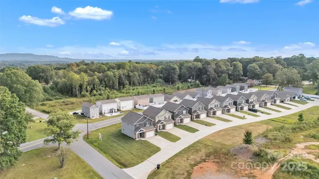 a view of a swimming pool with an ocean view