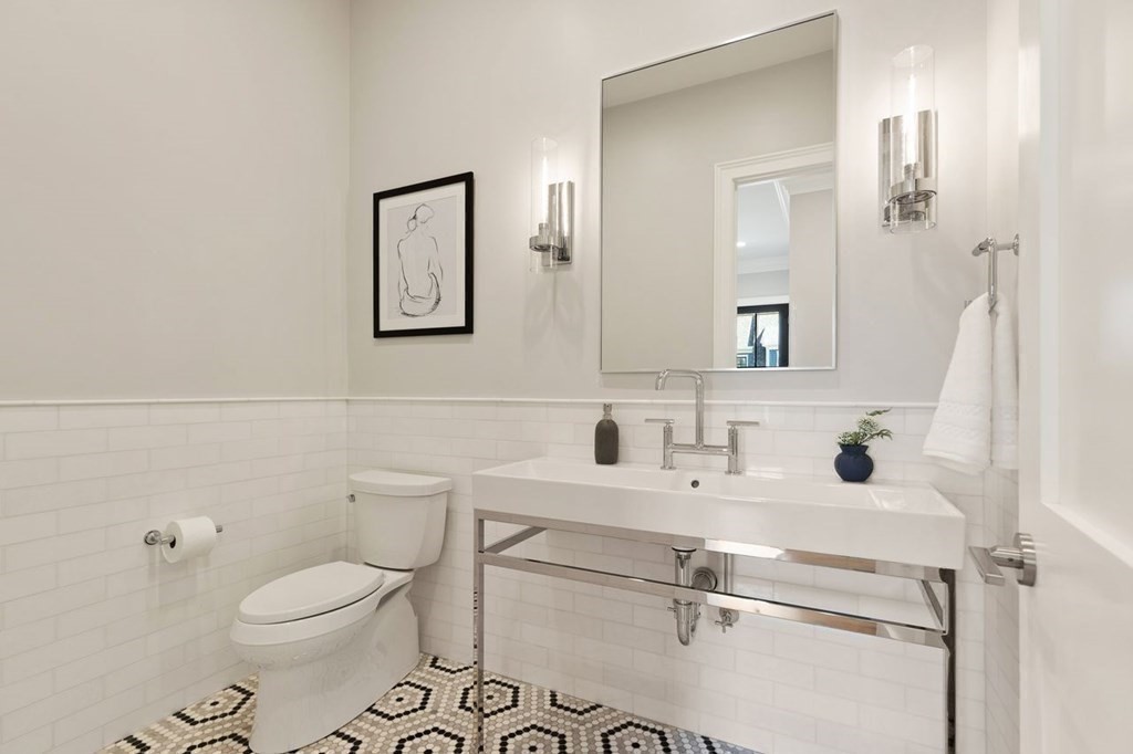 8 Hayes Avenue Lexington, MA 02420 - Photo 11 of 24 a bathroom with a sink mirror vanity and toilet