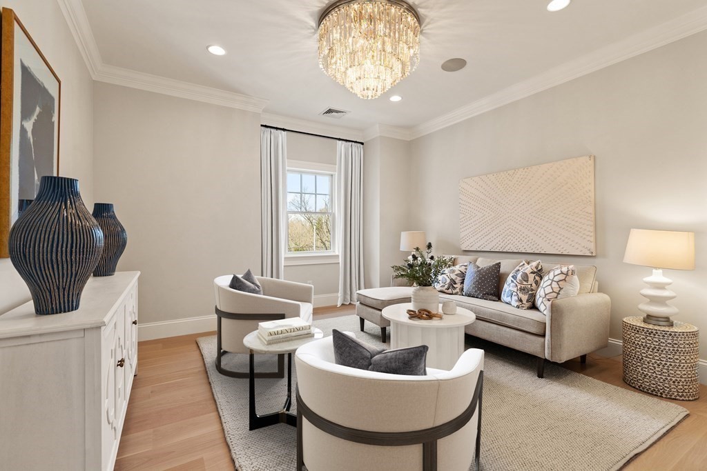 8 Hayes Avenue Lexington, MA 02420 - Photo 12 of 24 a living room with furniture and a large window