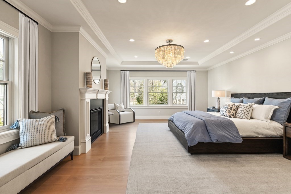 8 Hayes Avenue Lexington, MA 02420 - Photo 13 of 24 a spacious bedroom with a bed and a large window