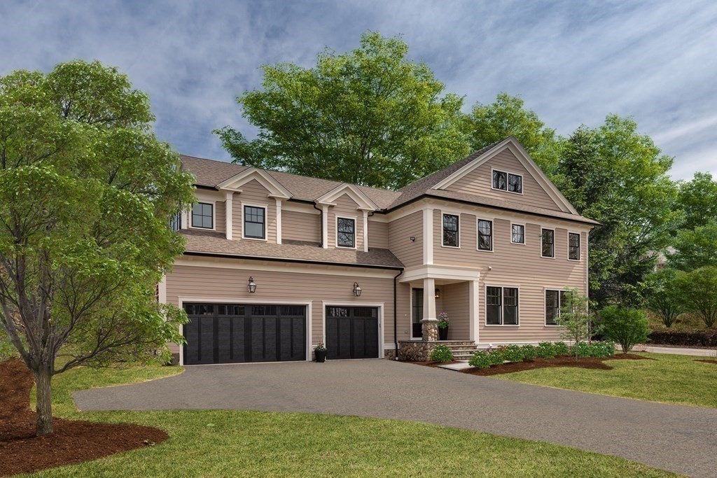 8 Hayes Avenue Lexington, MA 02420 - Photo 23 of 24 a front view of a house with a yard and garage