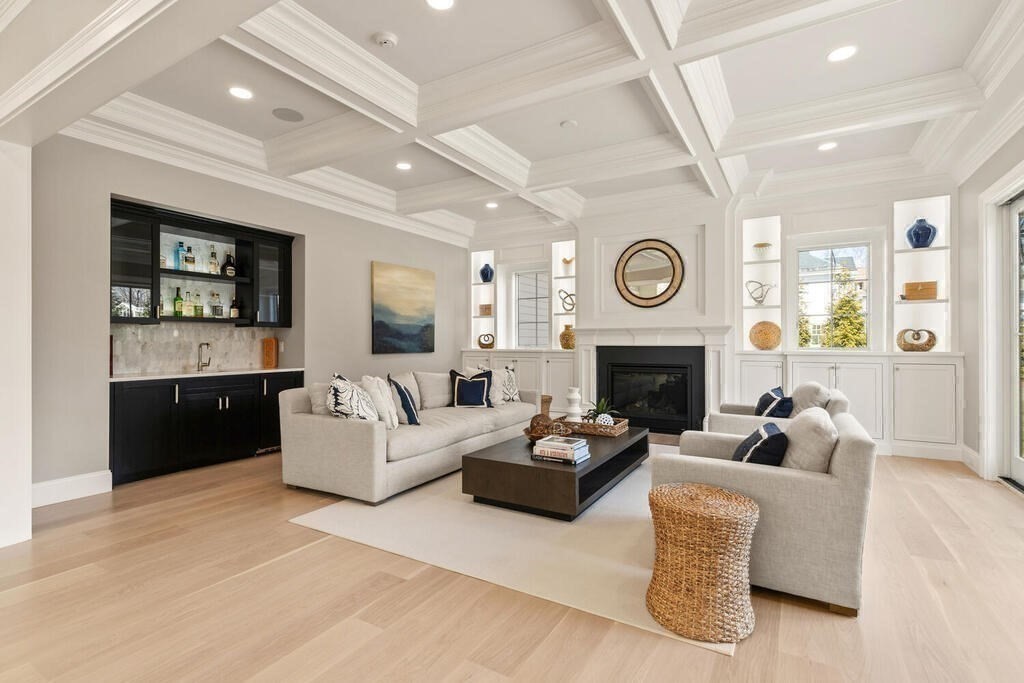 8 Hayes Avenue Lexington, MA 02420 - Photo 9 of 24 a living room with furniture and a fireplace