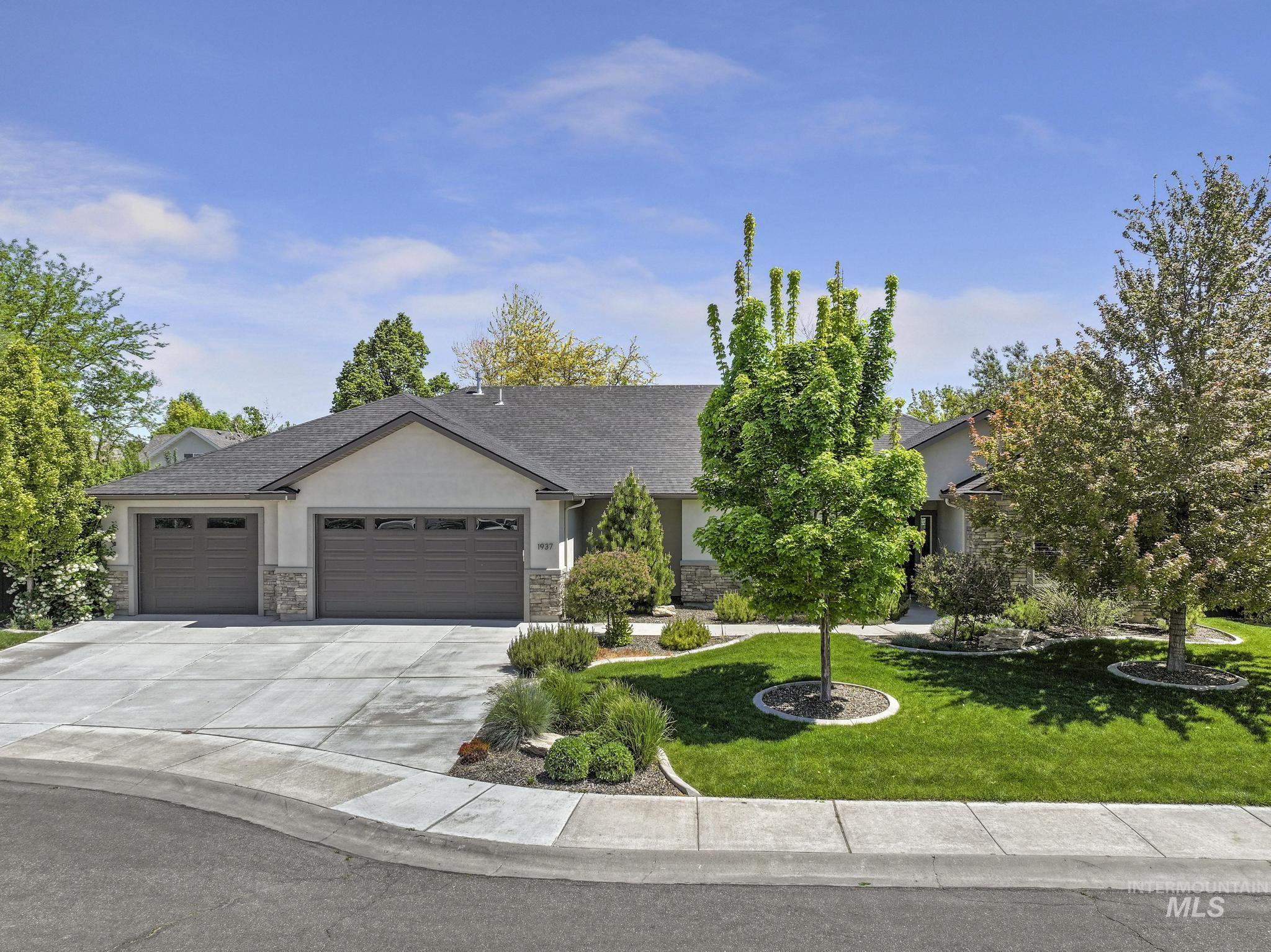 1937 Tamarack Loop Twin Falls, ID 83301 - Photo 2 of 50 Contemporary single-story residence with a gray shingle roof and stucco siding