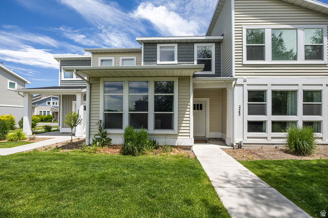 2483 South 1296th Street West Logan, UT 84321 - Photo 1 of 45 Contemporary exterior featuring varied siding materials and a prominent front walkway