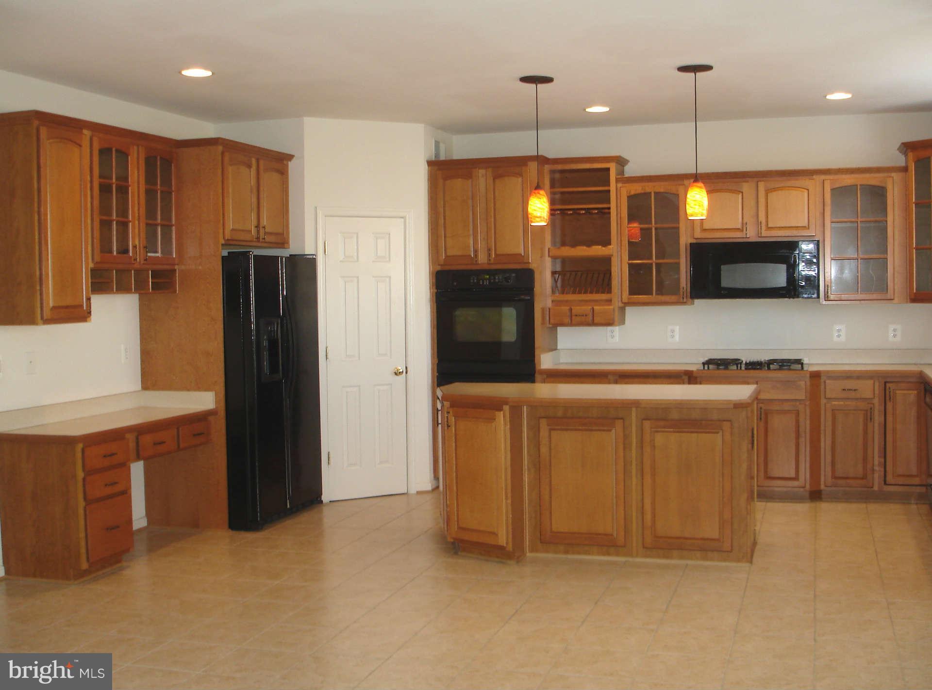 739 Blossom Tree Road Culpeper, VA 22701 - Photo 11 of 15 Kitchen with desk area