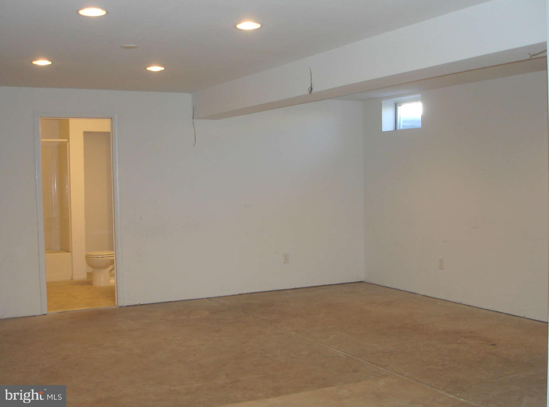 739 Blossom Tree Road Culpeper, VA 22701 - Photo 13 of 15 Theater Room w/ a few finishing touches needed.