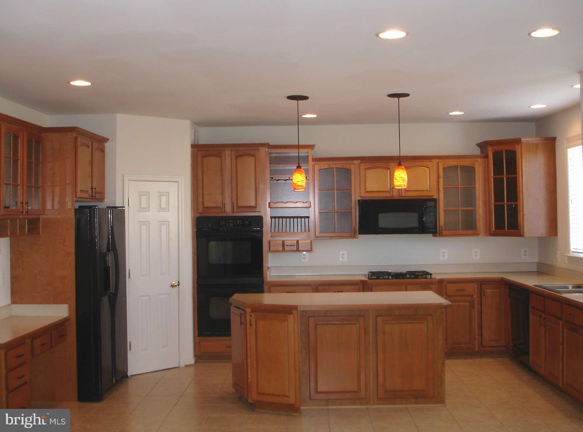 739 Blossom Tree Road Culpeper, VA 22701 - Photo 3 of 15 Beautiful cabinets and center island