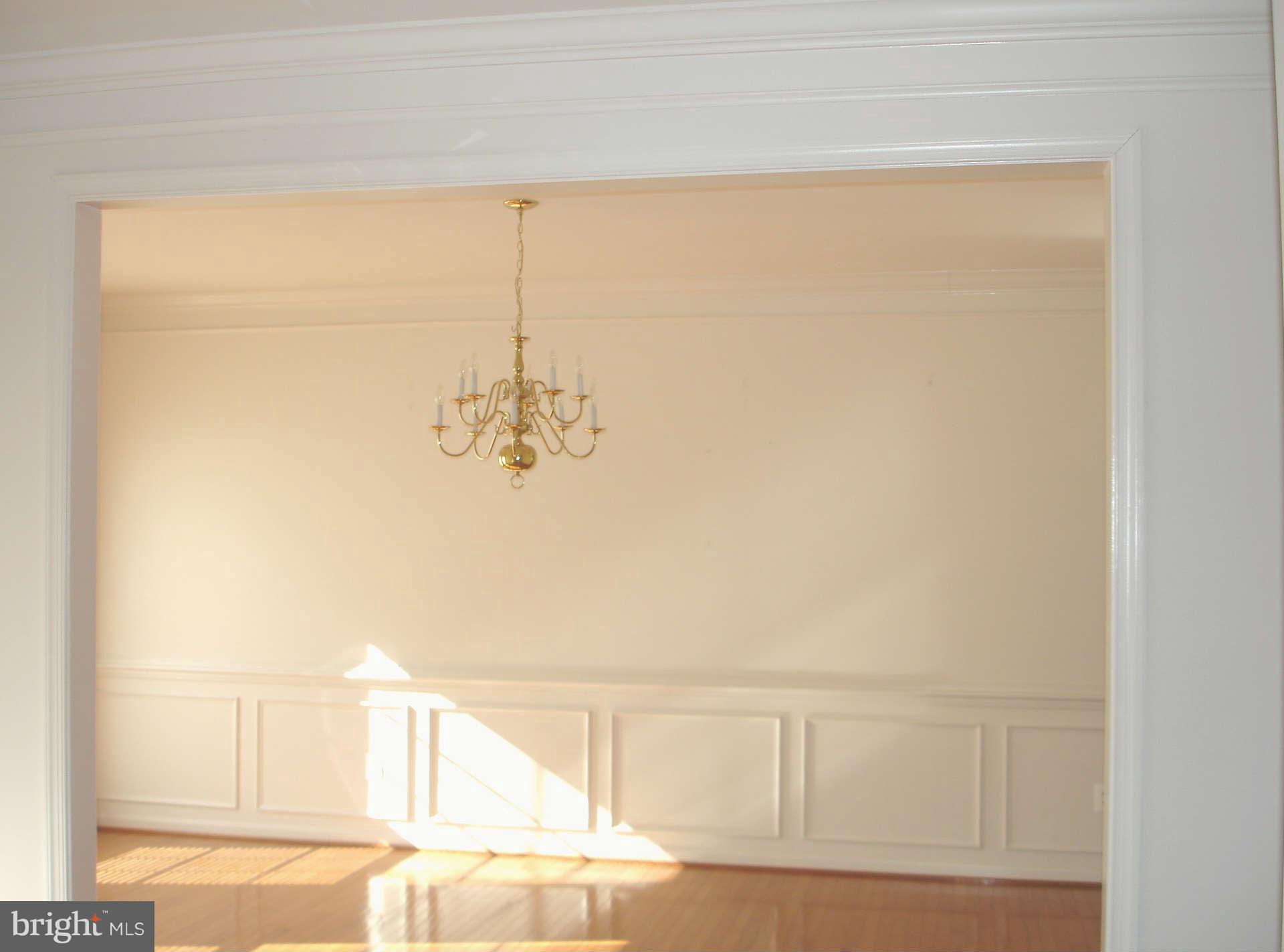 739 Blossom Tree Road Culpeper, VA 22701 - Photo 6 of 15 Formal Dining Room w/ custom mouldings