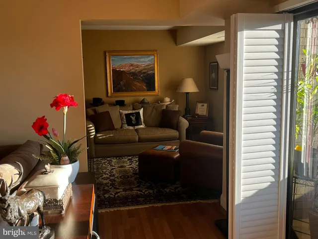 a bedroom with a bed and cabinet