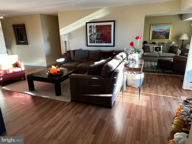 a bedroom with a bed and a lamp