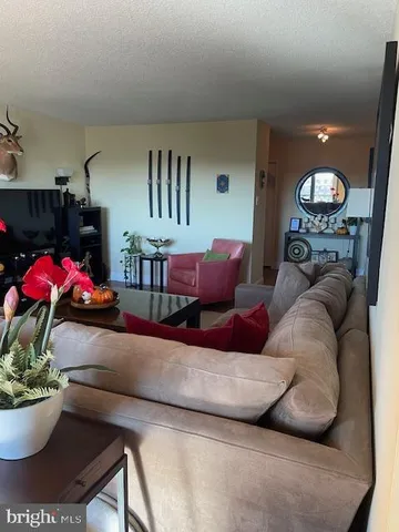 a bedroom with a bed and a lamp on table