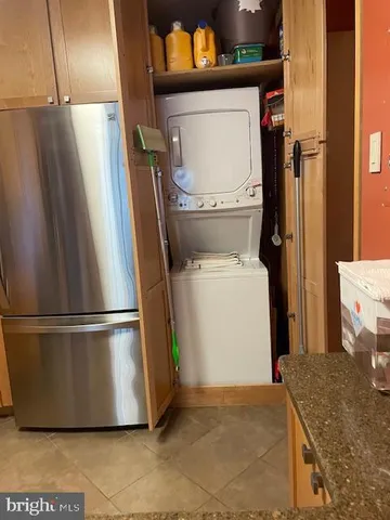 a room with furniture and a wooden door