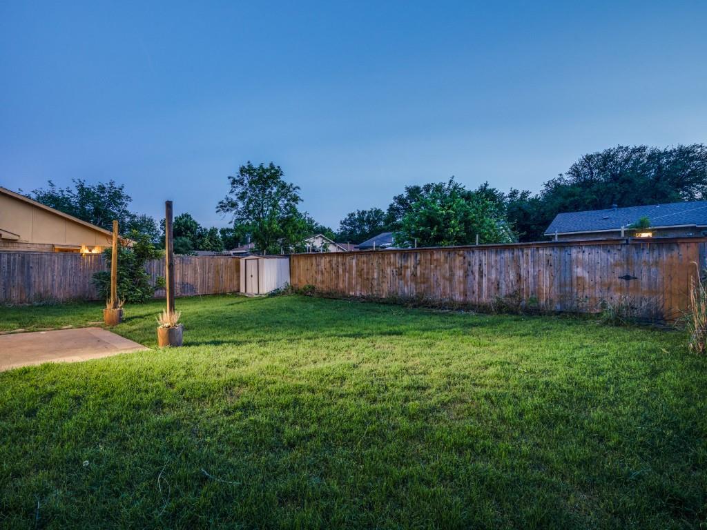 3425 Tarkio Road Plano, TX 75074 - Photo 21 of 25 a view of a backyard with green space