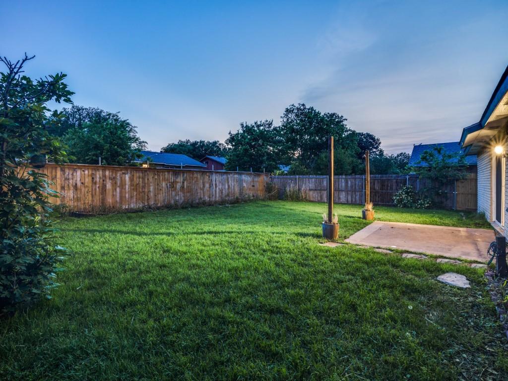 3425 Tarkio Road Plano, TX 75074 - Photo 22 of 25 a view of a backyard with a trampoline