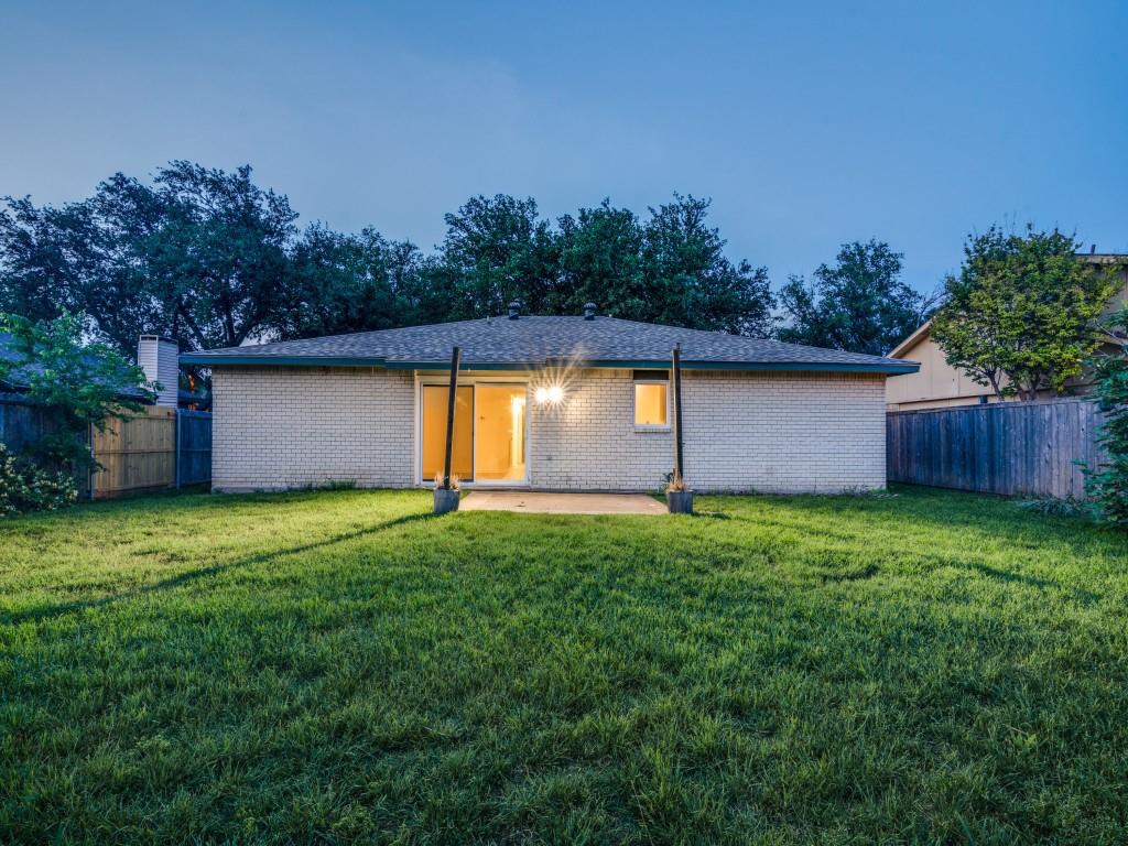 3425 Tarkio Road Plano, TX 75074 - Photo 24 of 25 a backyard of a house with lots of green space