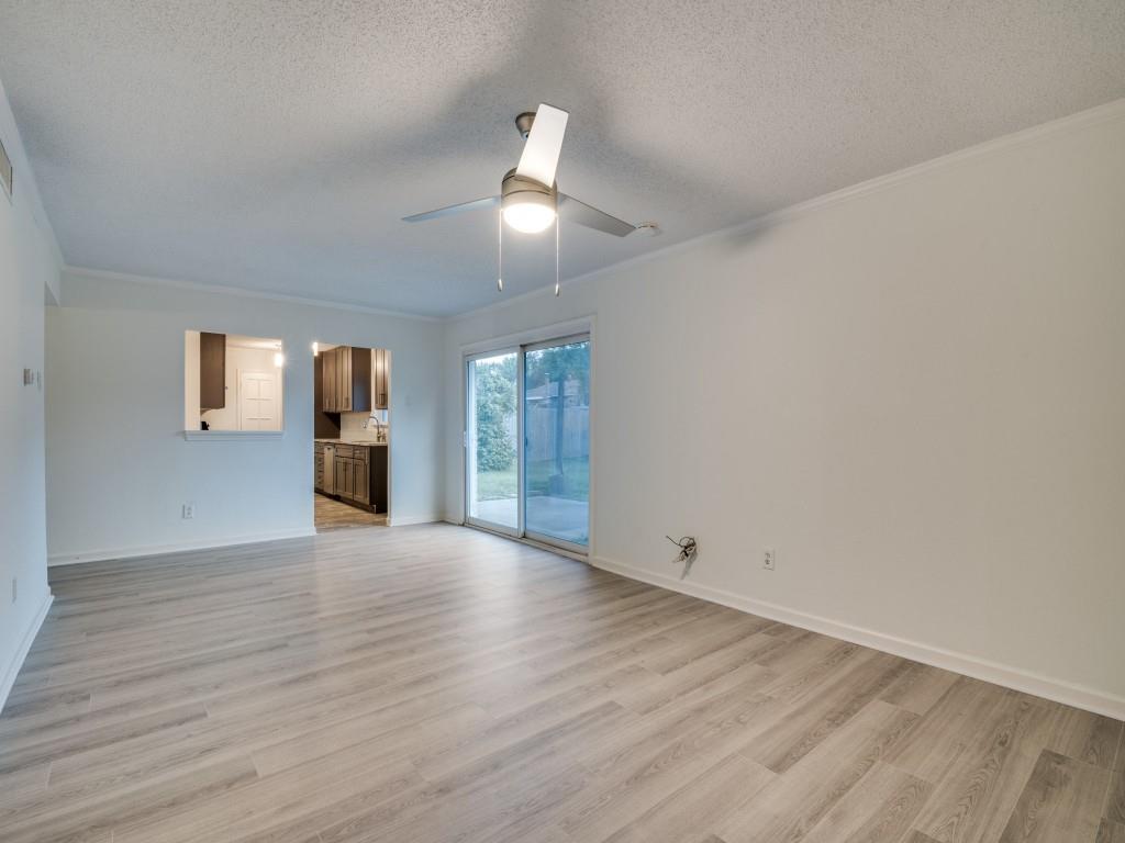 3425 Tarkio Road Plano, TX 75074 - Photo 7 of 25 wooden floor in an empty room with a window