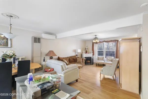 a living room with furniture and a table