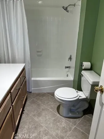 a bathroom with a toilet and a sink
