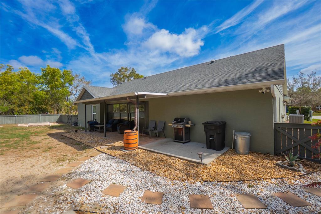5466 West Tortuga Loop Lecanto, FL 34461 - Photo 35 of 41 a view of a porch with furniture and a yard